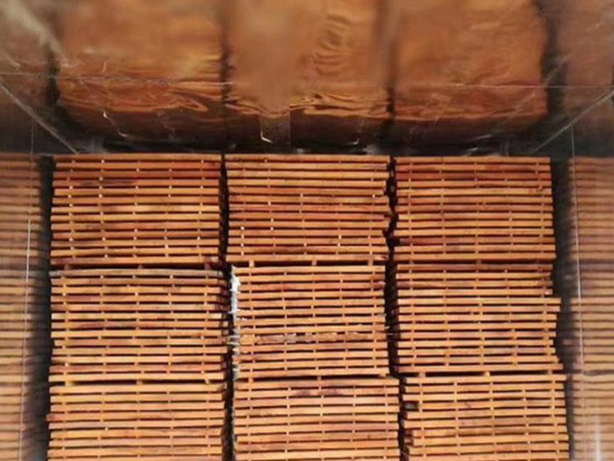 real panel and board dryer chamber loaded with lumber boards