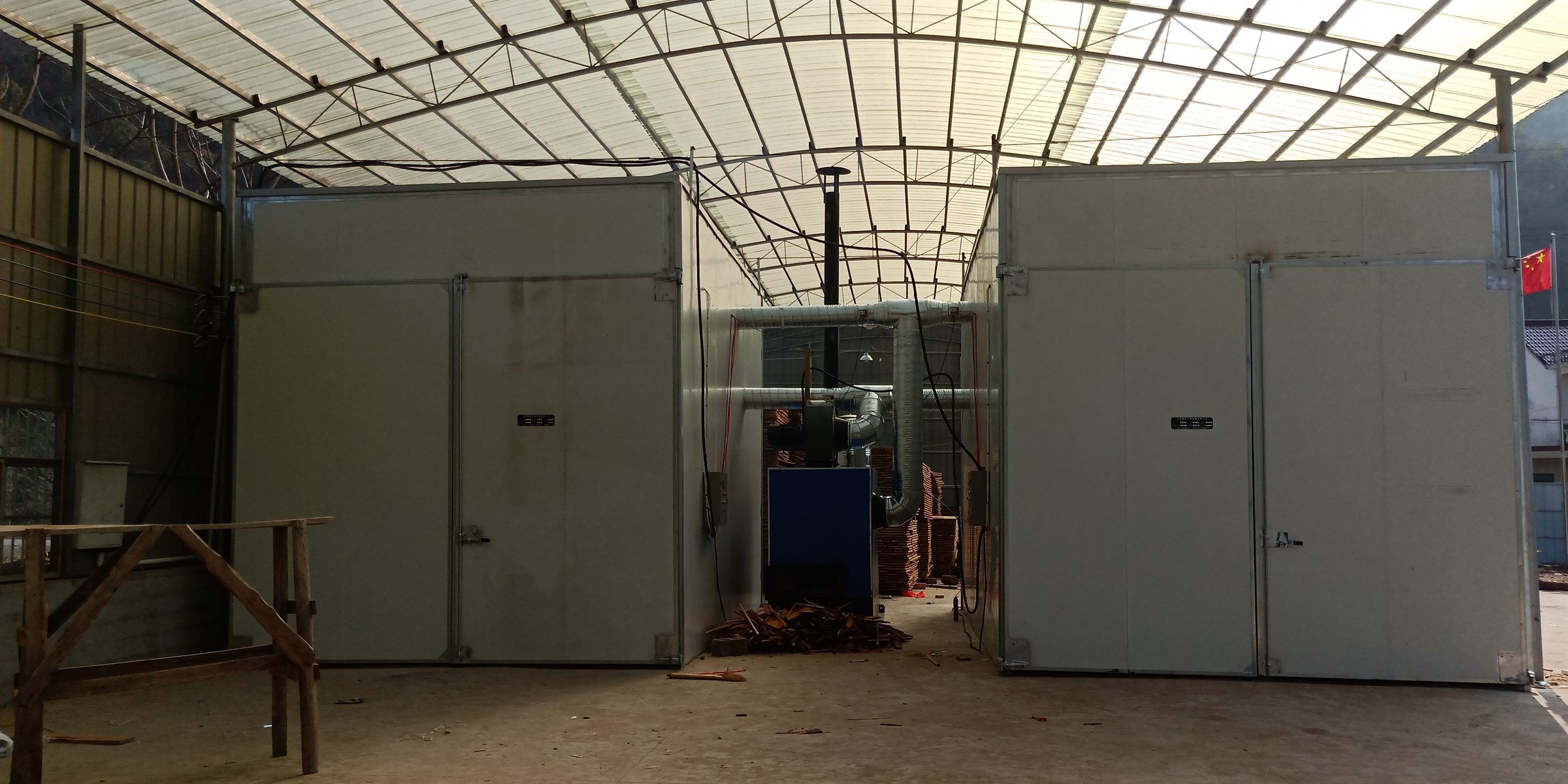 real factory workshop background with wood drying rooms and heat source system